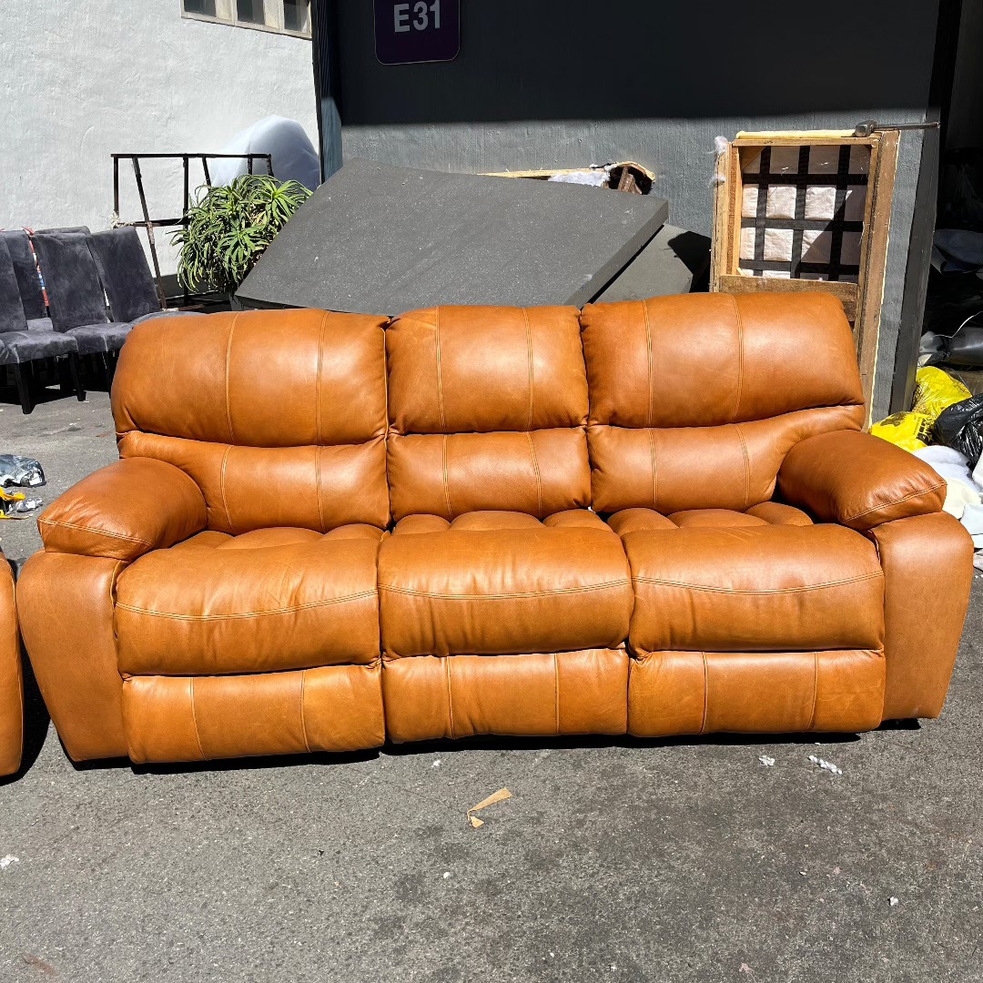 A genuine leather couch rebuilt and recovered by Wan-Puck Upholstery