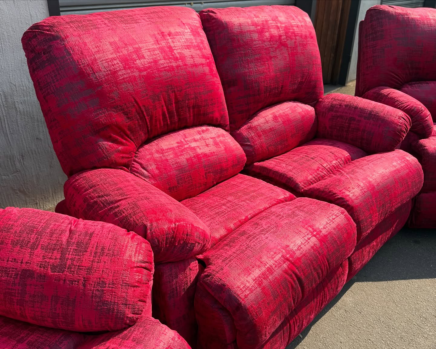 Couch recovered in deep two-tone red velvet by Wan-Puck Upholstery